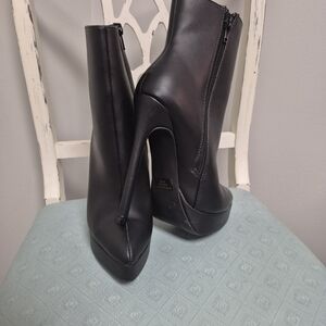 Fashion Nova Sleek Black Heeled Boots